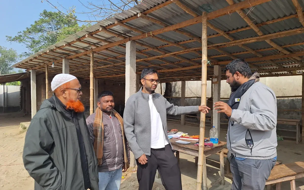 Cultivera team reviewing a field problem with local collaborators