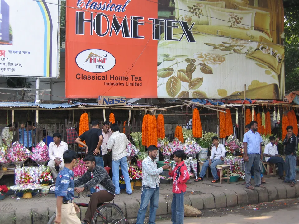 Flower vendors and buyers in Dhaka